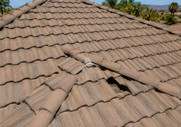 Broken tile on south slope