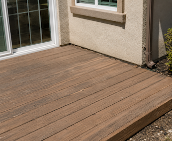 Wood deck on rear of property